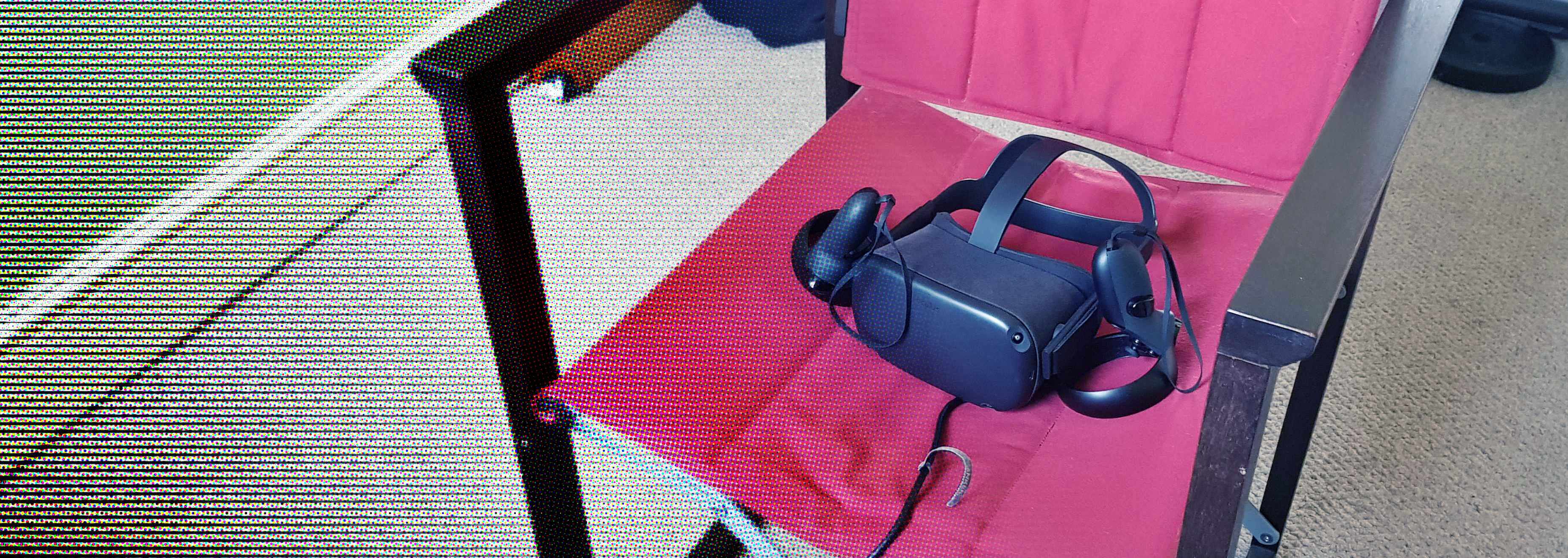 A VR headset resting on a pink chair